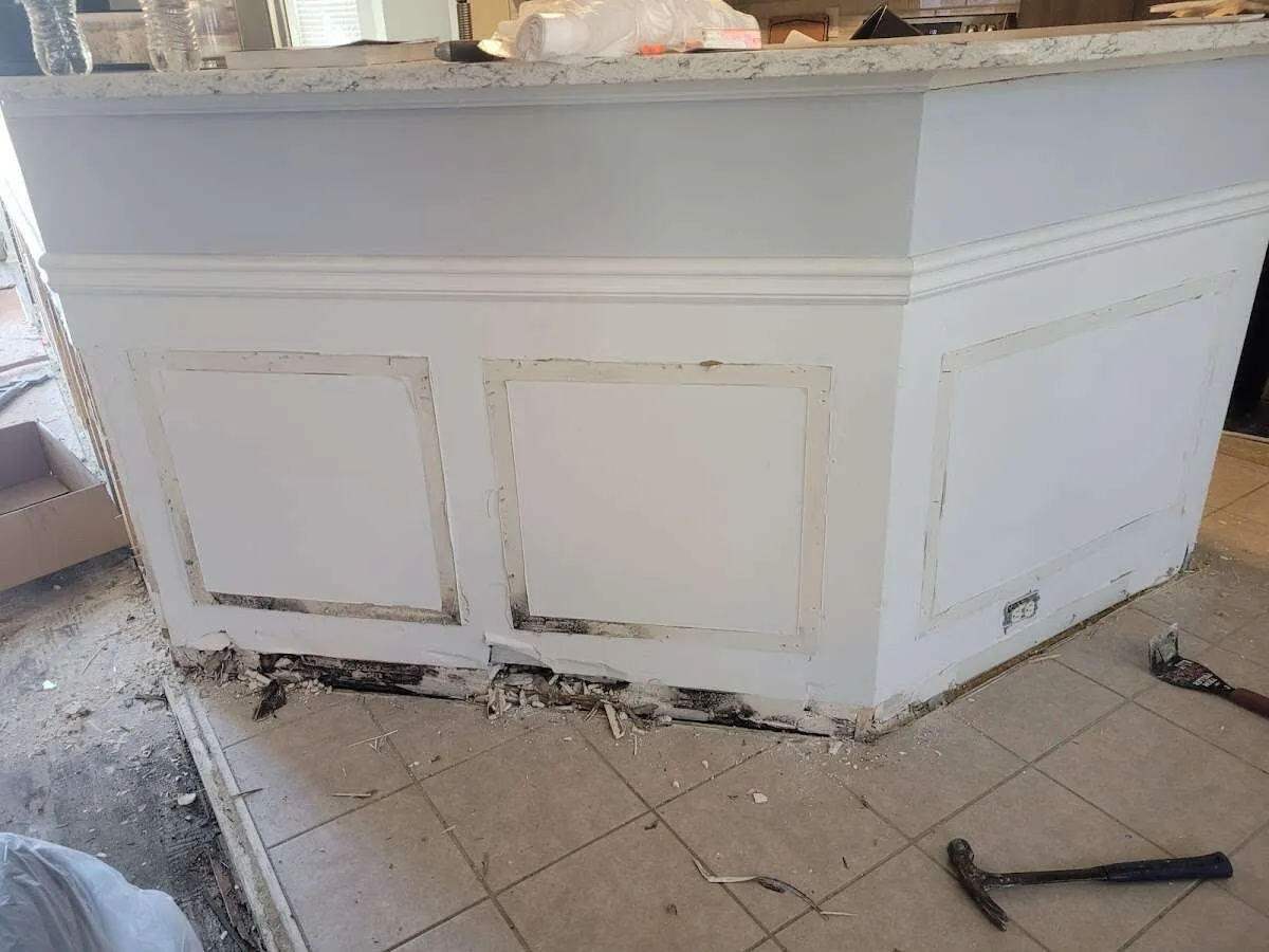 Water damage and mold on kitchen during Sewage Cleanup & Sanitation in Sans Souci